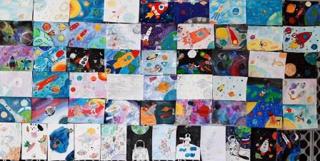 Ко Дню Космонавтики в нашей школе оформлена выставка рисунков "Нас зовут космические дали"