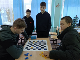 Участие в районном шашечно-шахматном турнире.